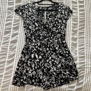 Angie Floral Romper With Skort Style Front